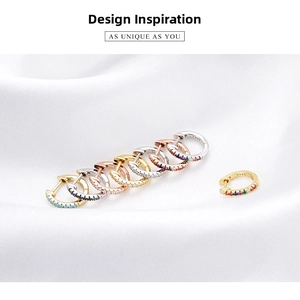 Detailed view of S925 silver hoop earrings with colorful gemstones and metal hallmark