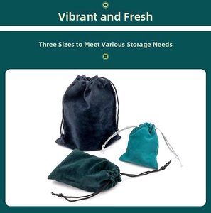 Three sizes of velvet drawstring jewelry pouches in dark blue, teal and forest green