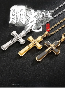 Detail view of punk double-layer cross pendants with twisted rope chains in three colors