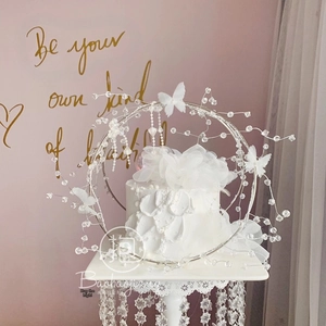 Handmade iron art cake topper with crystal beads and white butterfly for party and birthday decor.