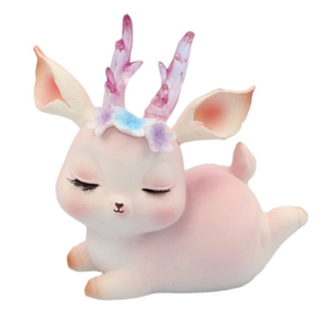 Cute pink resin reindeer cake topper decoration with purple crystal antlers and flowers