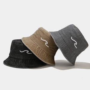 Three-color washed cotton bucket hats with wave embroidery in black, khaki, and dark grey