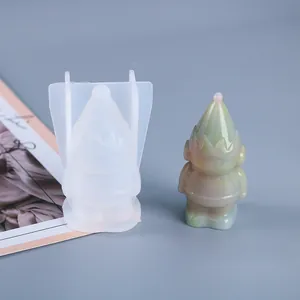 Macro view of 3D Christmas gnome silicone mold and resin casting gnome figurine