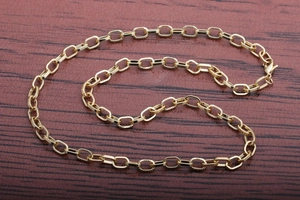 Hip hop gold plated cuban link chain necklace for men with engraved texture on dark wood