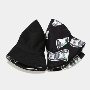 Unisex bucket hat set featuring a classic black cotton finish and creative dollar bill print