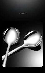 Close-up of mirror-polished stainless steel spoon with smooth rounded edges