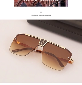 Detailed view of square gold frame sunglasses with brown gradient lenses and size markings