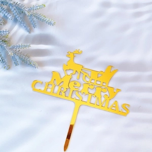 Golden Merry Christmas acrylic cake topper featuring Santa and reindeer silhouette