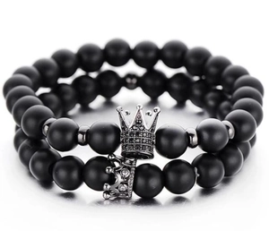 Matte black stone bead bracelet set with silver crown charms and micro-inlaid rhinestones