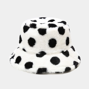 Close-up of soft plush polka dot bucket hat featuring fluffy faux fur texture for winter