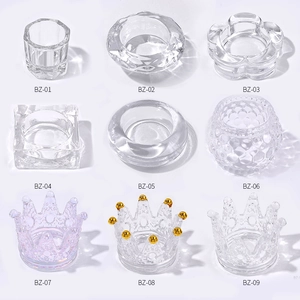 Set of 9 crystal glass nail liquid cups in various styles from hexagonal to crown shapes