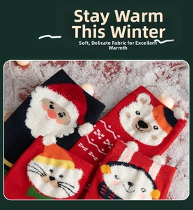 Detail of soft cartoon Christmas socks featuring Santa and bear motifs with festive LED lights