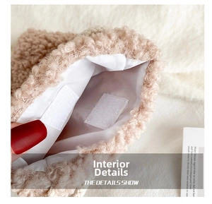 Detail of the soft plush handbag showing the grey fabric lining and velcro closure
