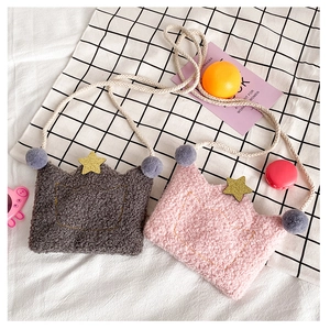 Detailed plush crown-shaped crossbody bags with soft faux lamb wool and star embroidery