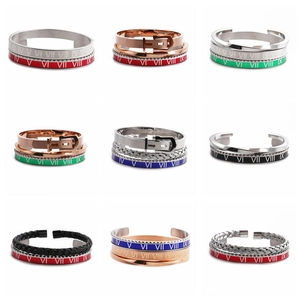 Detailed grid view of assorted stainless steel bracelets with Roman numeral engravings