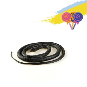 Realistic black rubber snake toy with scaly texture coiled on a clean white background