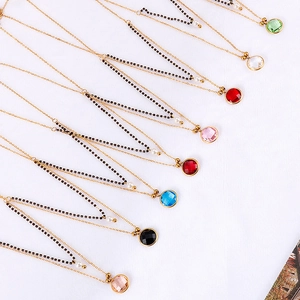 Double-layered gold chain necklaces with glass pearls and colorful gemstone pendants
