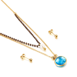 Double-layered gold necklace set with blue gemstone pendant and pearl earrings