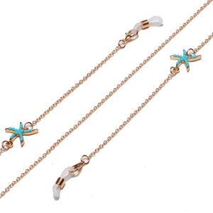Golden punk beach style eyeglass chain with turquoise starfish charms and silicone loops