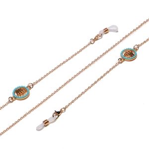 Golden punk style eyewear chain with blue turquoise beads and crown pendants for women