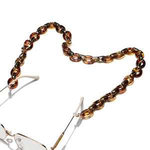 Chaîne de lunettes tendance en acrylique léopard ambré et anneaux dorés élégants