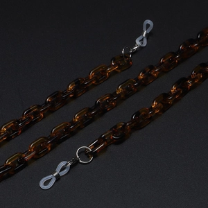 Close-up of leopard pattern acrylic eyeglass chain with resin links and silicone loops