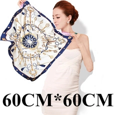 Silk-like square scarf 60x60cm featuring geometric triangle pattern worn by a model