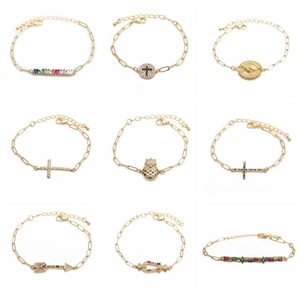 Nine gold hip hop bracelets featuring rainbow zircon pineapple and cross charms for women