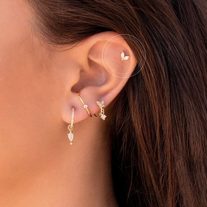 Minimalist S925 silver stud earrings with marquise diamonds and butterfly design