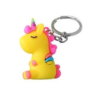 Cute yellow cartoon unicorn PVC keychain with pink mane and metal ring for bags