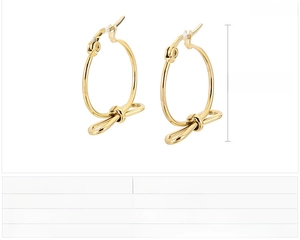 Détail des boucles d'oreilles nœud dorées 22x19mm en acier inoxydable avec dimensions