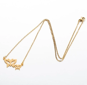Detailed close-up of a golden stainless steel necklace with double butterfly pendants