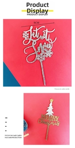 Close-up of 9cm glittery acrylic cake toppers featuring Merry Christmas tree and Let it Snow