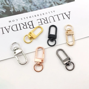 Detailed set of six colorful metal lobster claw clasps with 360-degree swivel rings