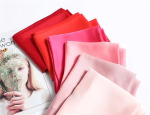 Detail showing the smooth chiffon fabric texture and various gradient color swatches
