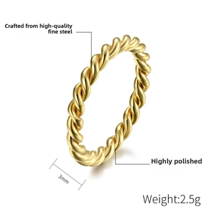 Detailed view of 3mm gold twisted steel ring showing weight specifications and fine polishing