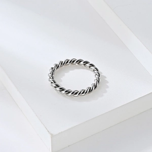 Silver multi-strand twisted rope Mobius ring in a minimalist industrial style