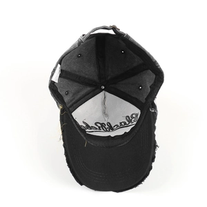 Internal view of washed vintage baseball cap showing stitching and Black Rebel embroidery