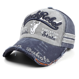 Distressed vintage baseball cap in gray and blue patchwork with Black Rebel embroidery