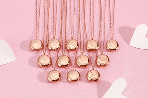 Detailed collection of rose gold zodiac necklaces with sparkling small diamonds