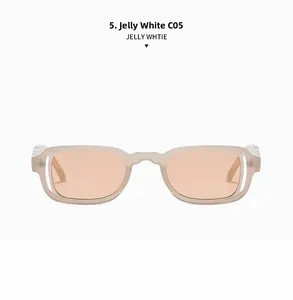 Detail view of jelly white rectangular sunglasses with light orange tinted lenses