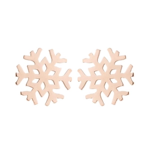 Macro detail of rose gold snowflake earrings featuring a polished stainless steel finish