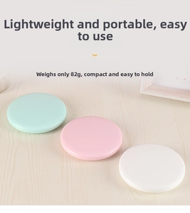 Lightweight 82g handheld LED makeup mirrors in mint, pink, and white colors