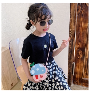 Close-up of a blue and pink mushroom-shaped PU leather crossbody bag for little girls