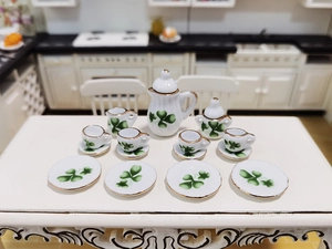 Miniature dollhouse ceramic tea set with green clover pattern and gold trim 15 pieces