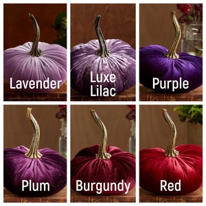 Detailed view of handmade velvet pumpkins in six rich purple and red festive autumn colors