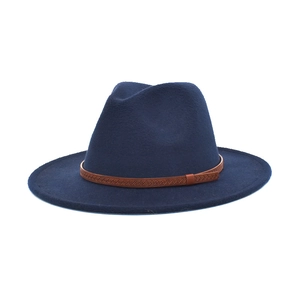 Detail of navy blue felt fedora hat featuring a brown embossed decorative band and texture