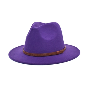 Close-up of deep purple wool jazz fedora with a brown leather braided belt band detail