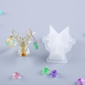 Detailed DIY silicone mold for geometric reindeer resin craft with gold leaf finish