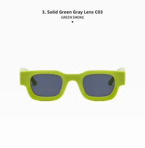 Detail view of bold green rectangle sunglasses with smoke lenses and C03 model marking